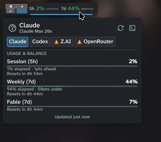 The KDE Plasma panel widget showing AI provider usage.